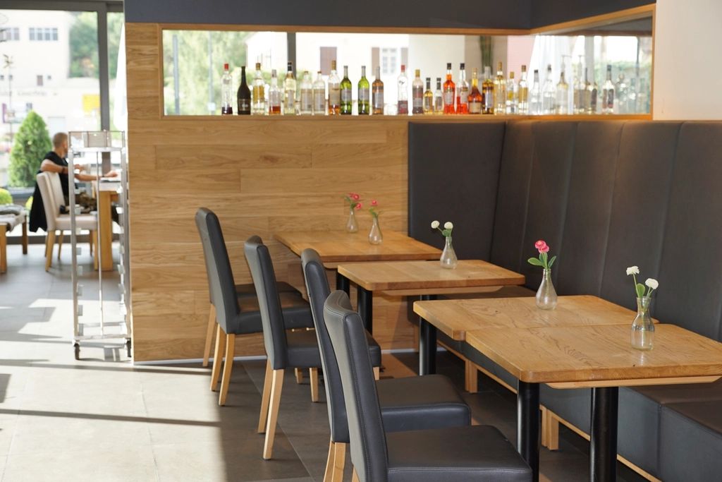 The cafe counter with stools alongside