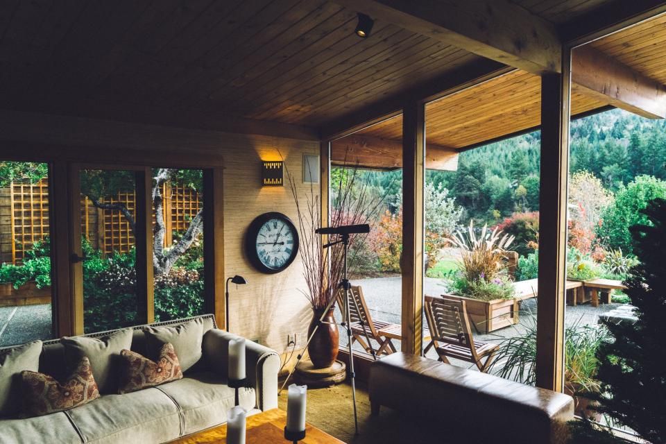 A suite sitting room with a sofa and armchairs